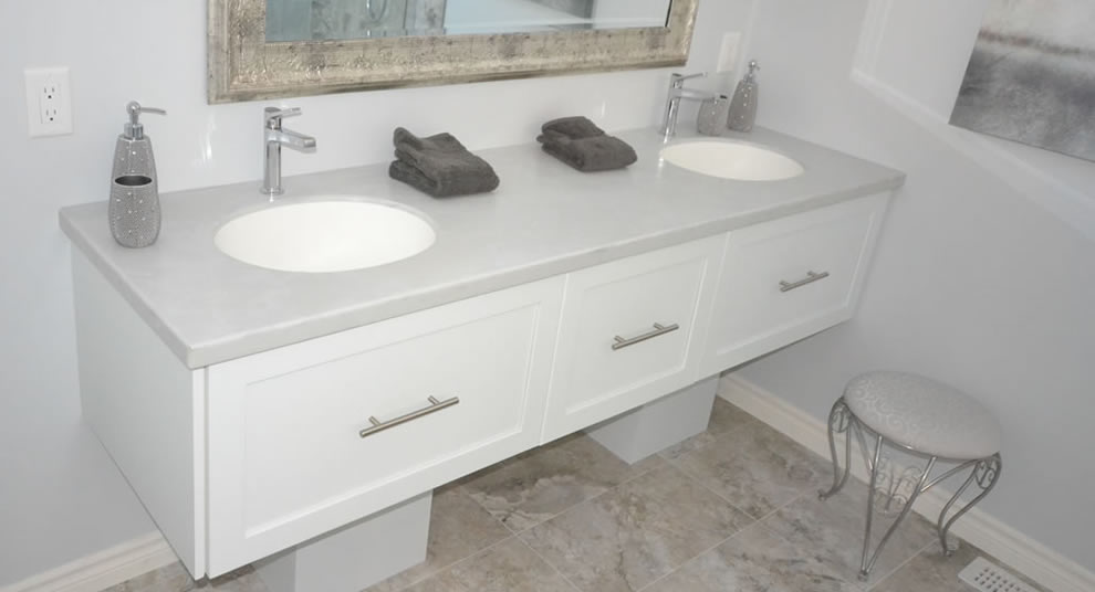 Solid surface white double sink bathroom vanity custom countertops Mike's Countertop Shop Sudbury Ontario.
