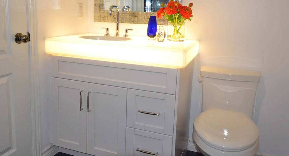 White backlit sink bathroom vanity solid surface custom countertops Mike's Countertop Shop Sudbury Ontario